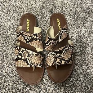 Snakeskin women’s sandals.